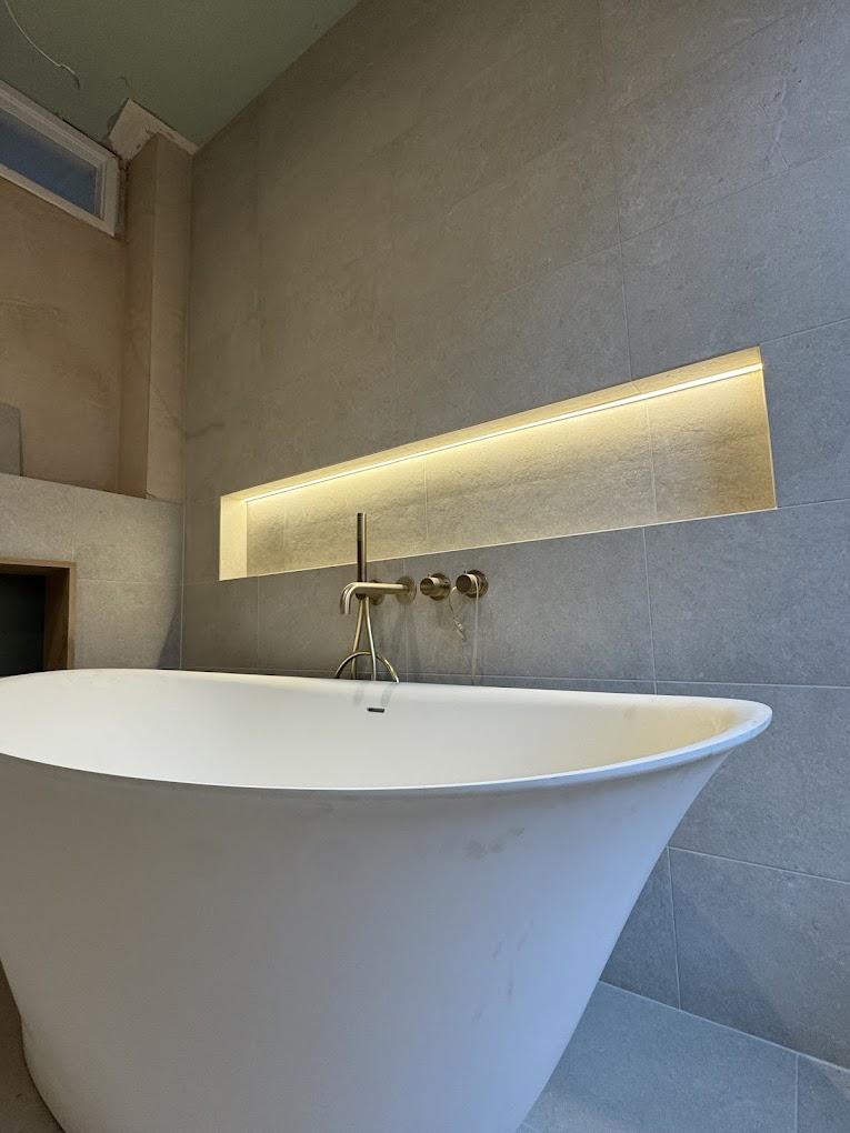 Concealed LED strip lighting installed in a bathroom